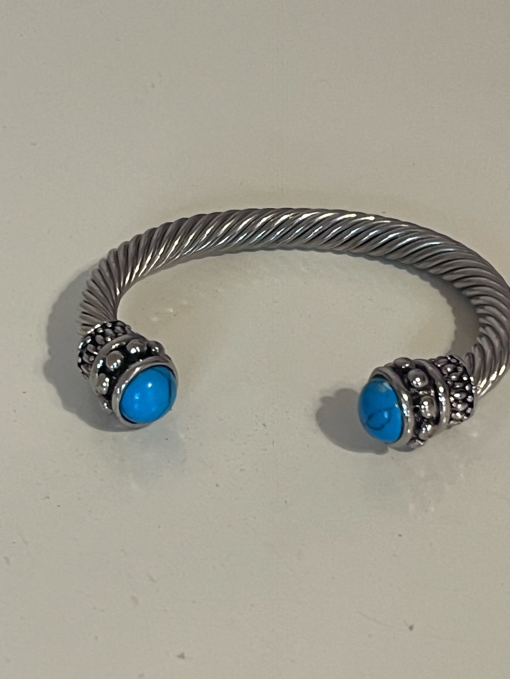 Silver Tone Cable Wire Cuff Bracelet with Faux Turquoise End Caps